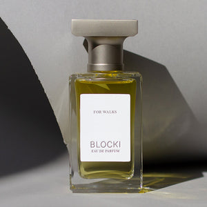 Stylized photo of 50ml glass bottle of For Walks perfume