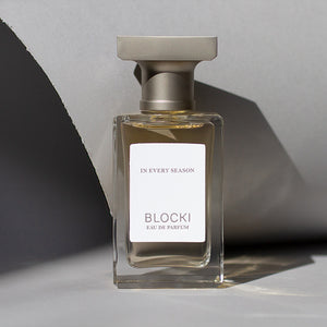Stylized photo of 50ml glass bottle of In Every Season perfume