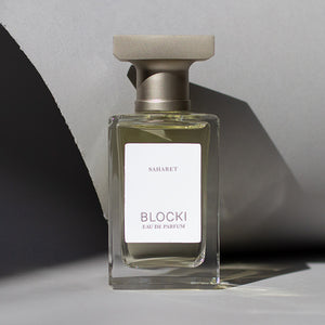 Stylized photo of 50ml glass bottle of Saharet perfume